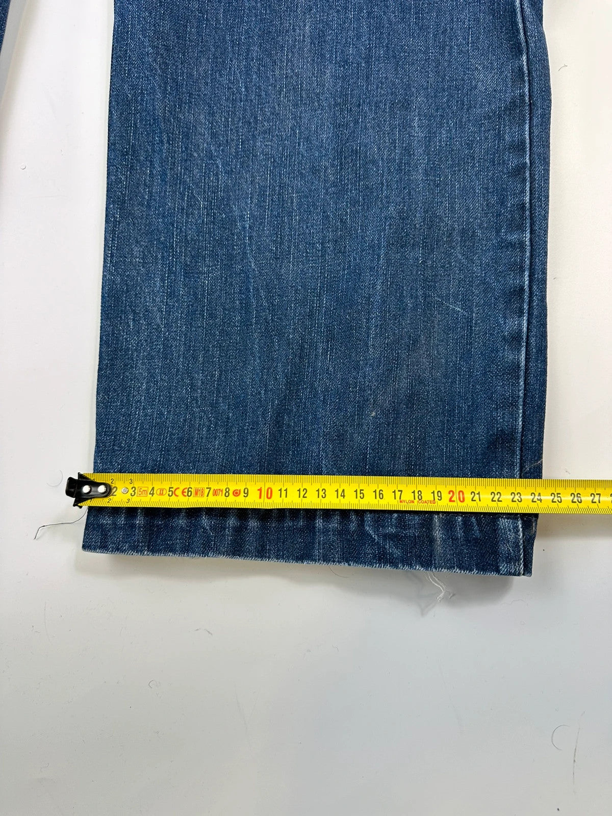 Marithé François Girbaud blue baggy jeans with wide legs and vintage 90s style.