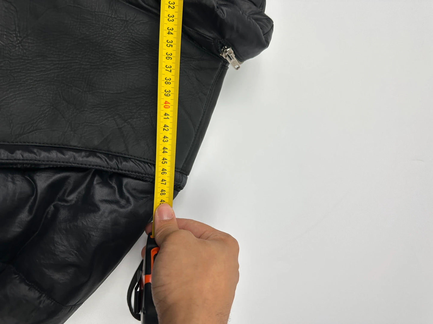 Armani black puffer bomber jacket, leather and nylon, removable sleeves, vintage 90s style.