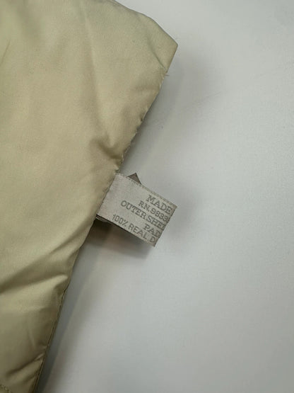 Prada beige puffer scarf with cream accents and magnetic closure, featuring signature logo.