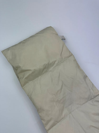 Prada beige puffer scarf with cream accents and magnetic closure, featuring signature logo.