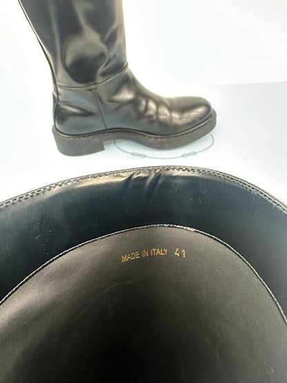 Prada black knee-high boots in patent leather with logo detail and elegant design.