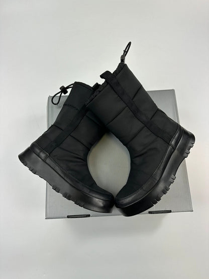 Prada black moon boots with chunky sole and polar lining, vintage FW1999 collection.