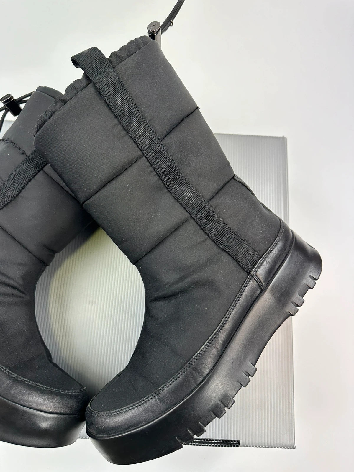 Prada black moon boots with chunky sole and polar lining, vintage FW1999 collection.