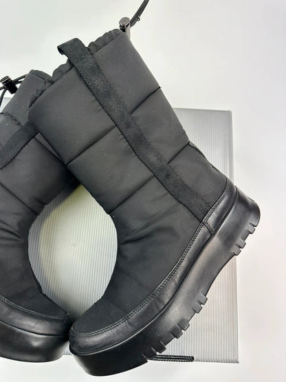 Prada black moon boots with chunky sole and polar lining, vintage FW1999 collection.