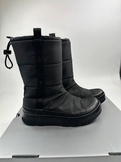 Prada black moon boots with chunky sole and polar lining, vintage FW1999 collection.