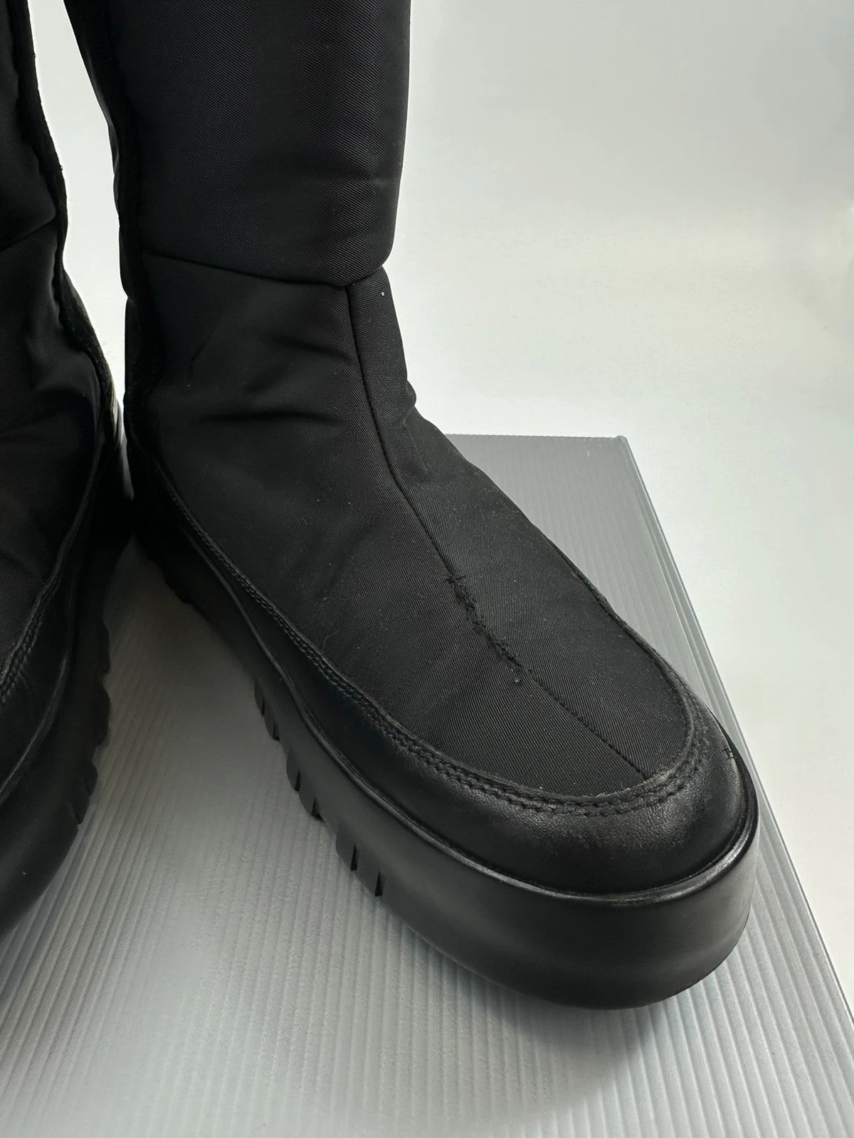 Prada black moon boots with chunky sole and polar lining, vintage FW1999 collection.