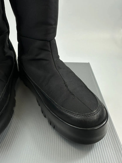 Prada black moon boots with chunky sole and polar lining, vintage FW1999 collection.