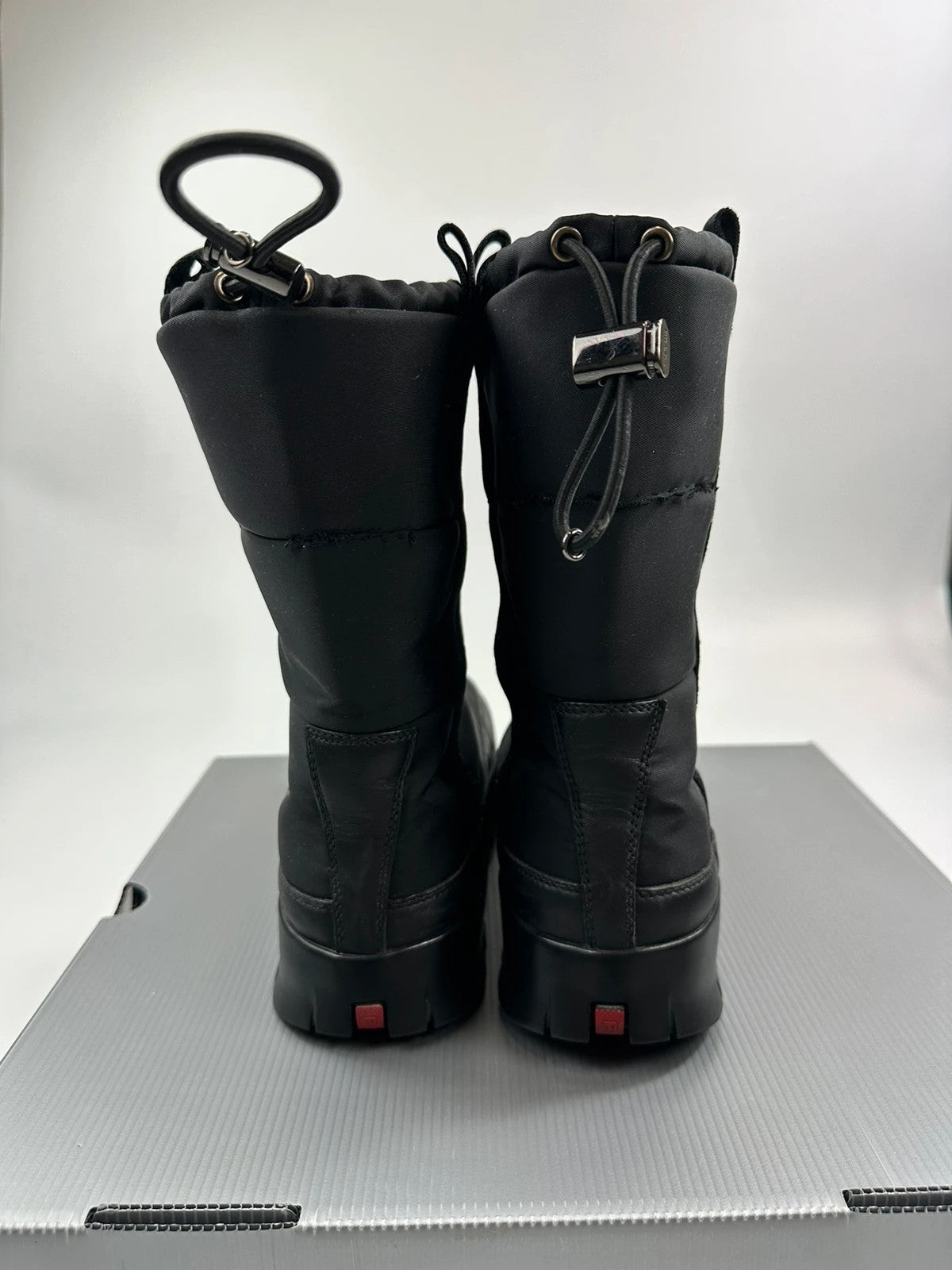 Prada black moon boots with chunky sole and polar lining, vintage FW1999 collection.