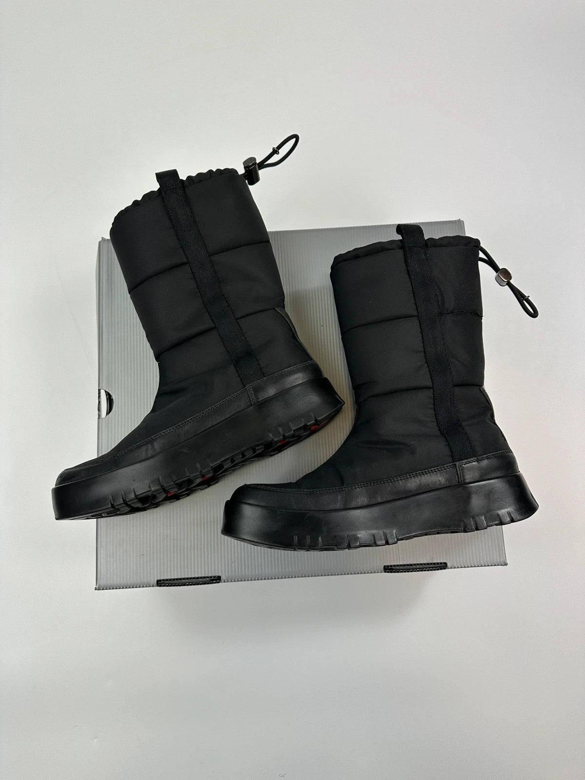 Prada black moon boots with chunky sole and polar lining, vintage FW1999 collection.