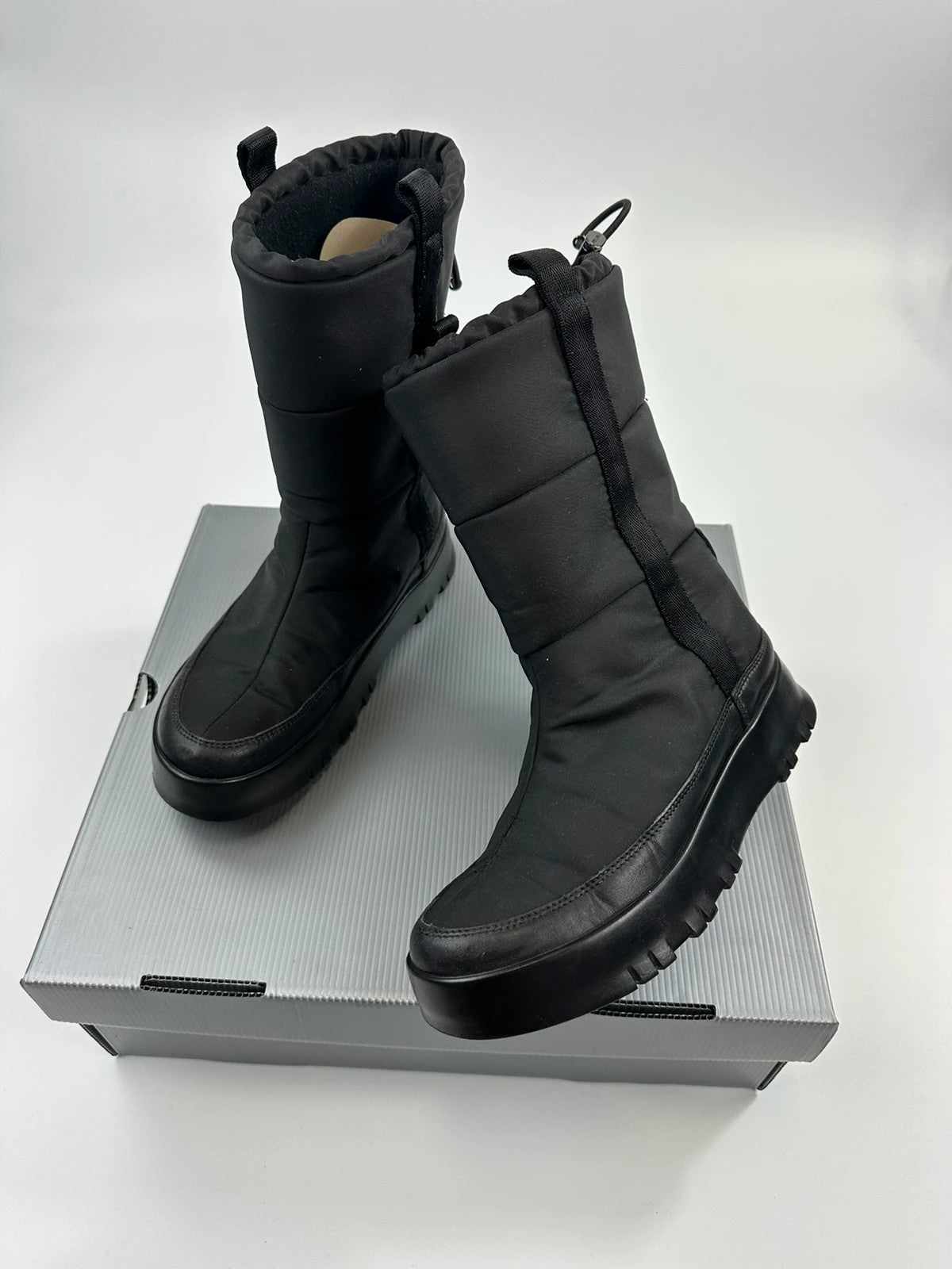 Prada black moon boots with chunky sole and polar lining, vintage FW1999 collection.