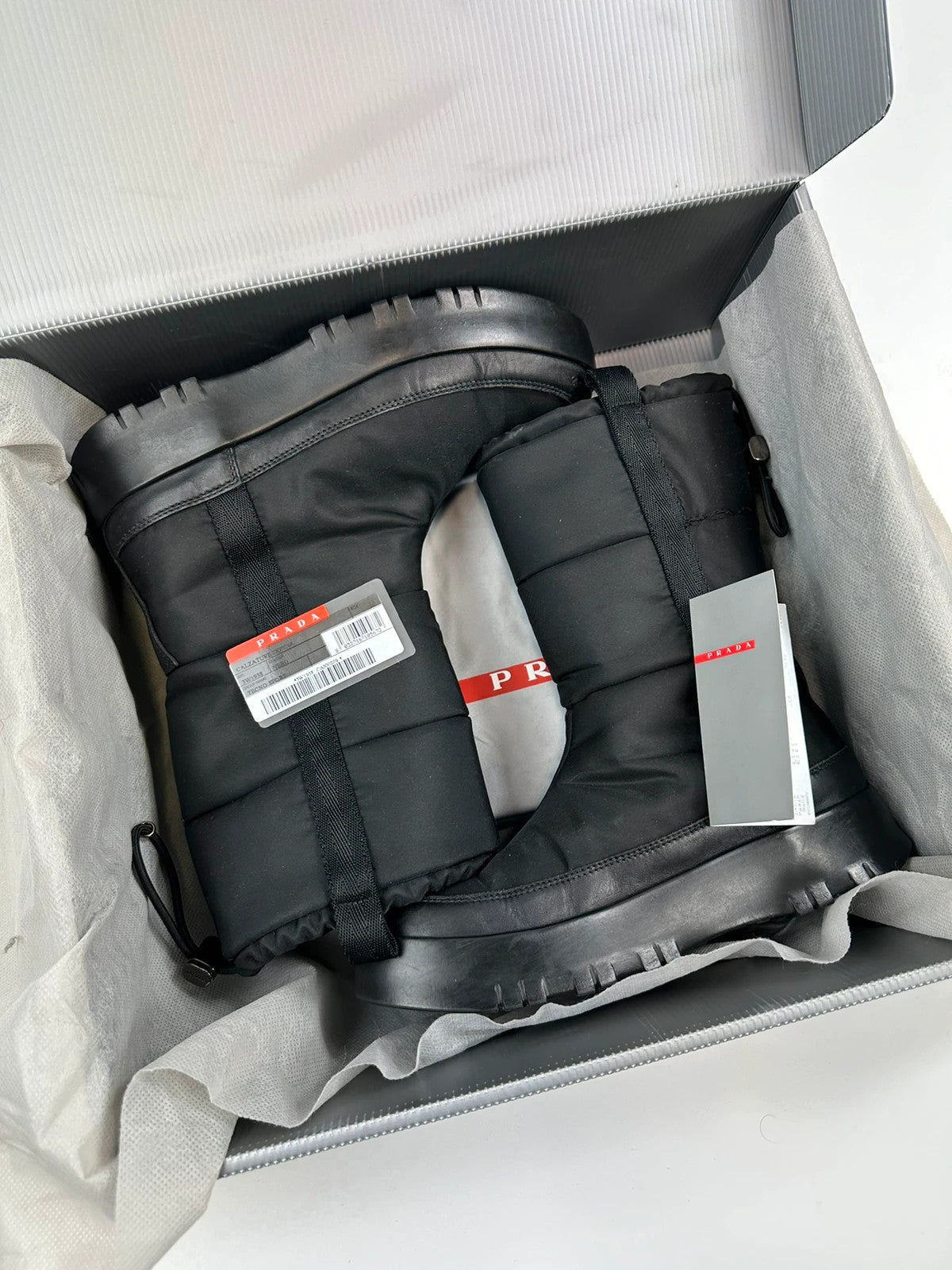 Prada black moon boots with chunky sole and polar lining, vintage FW1999 collection.