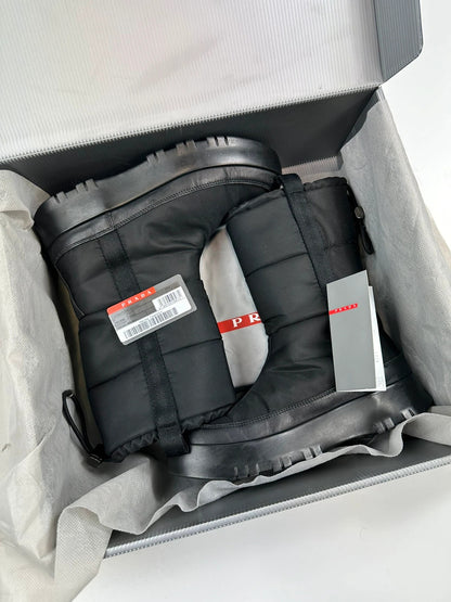Prada black moon boots with chunky sole and polar lining, vintage FW1999 collection.