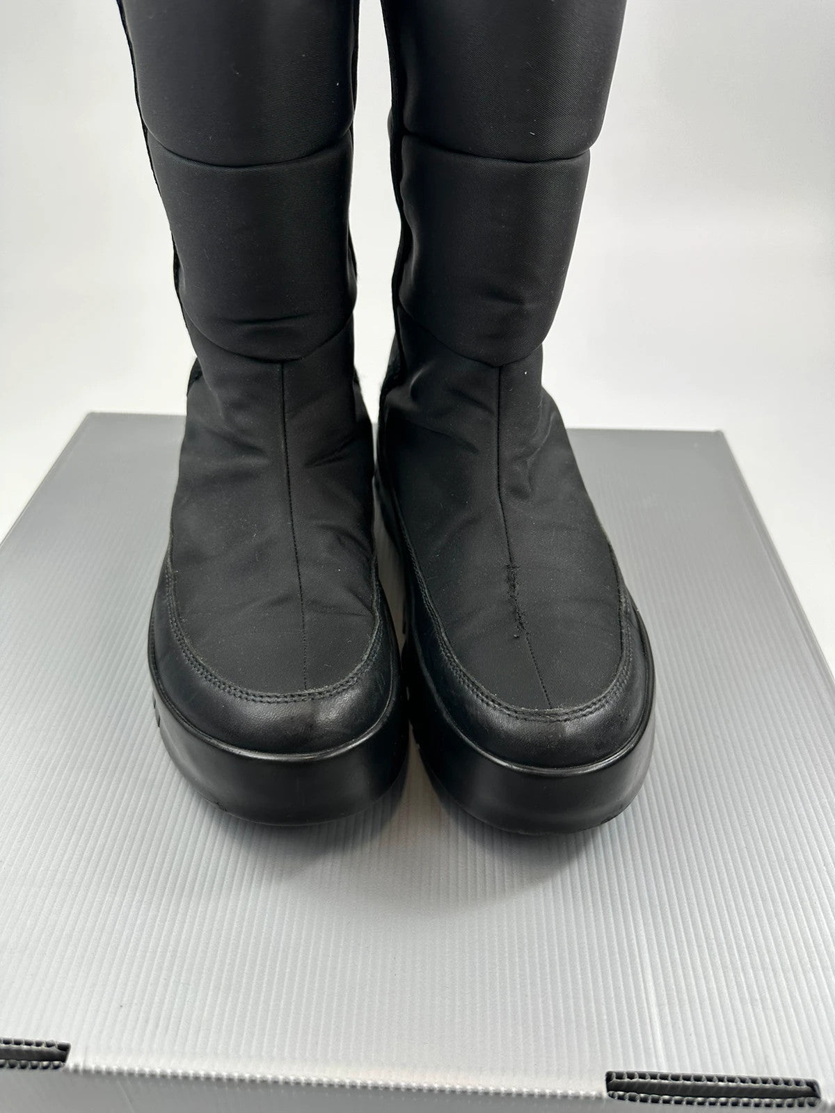 Prada black moon boots with chunky sole and polar lining, vintage FW1999 collection.