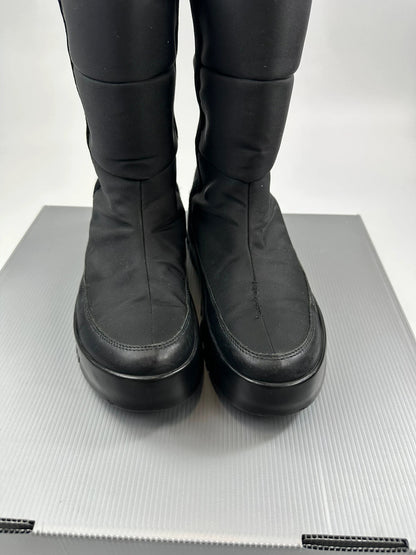 Prada black moon boots with chunky sole and polar lining, vintage FW1999 collection.