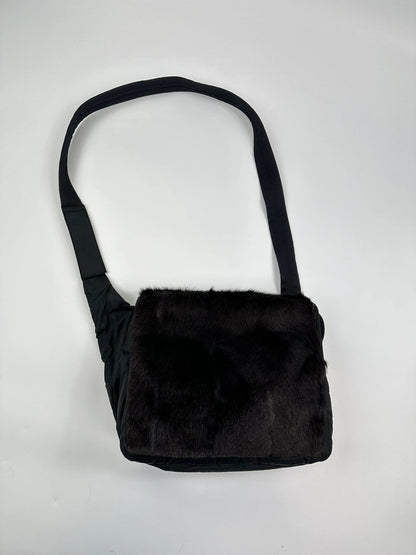 Prada black nylon crossbody bag with fur accents and linearossa logo.