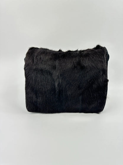 Prada black nylon crossbody bag with fur accents and linearossa logo.