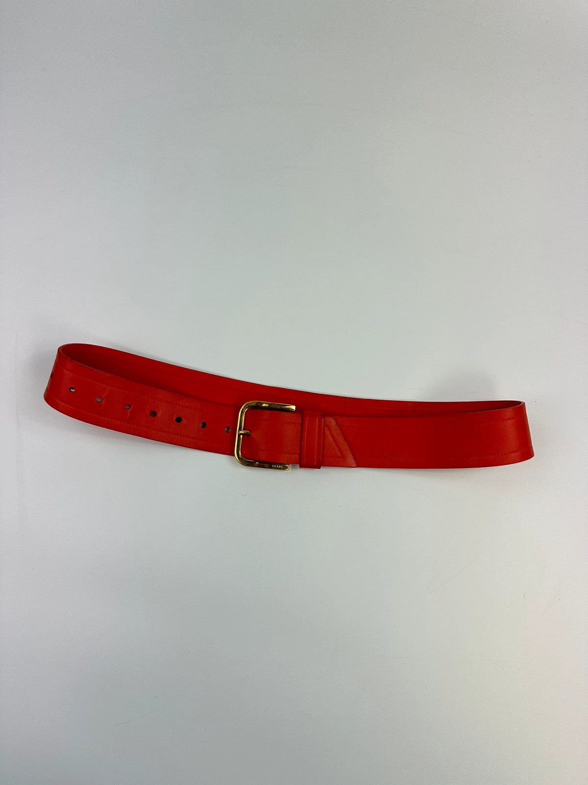 Prada burgundy leather belt with large rose gold buckle, vintage 2010 collection.