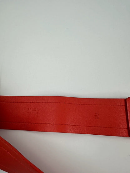 Prada burgundy leather belt with large rose gold buckle, vintage 2010 collection.