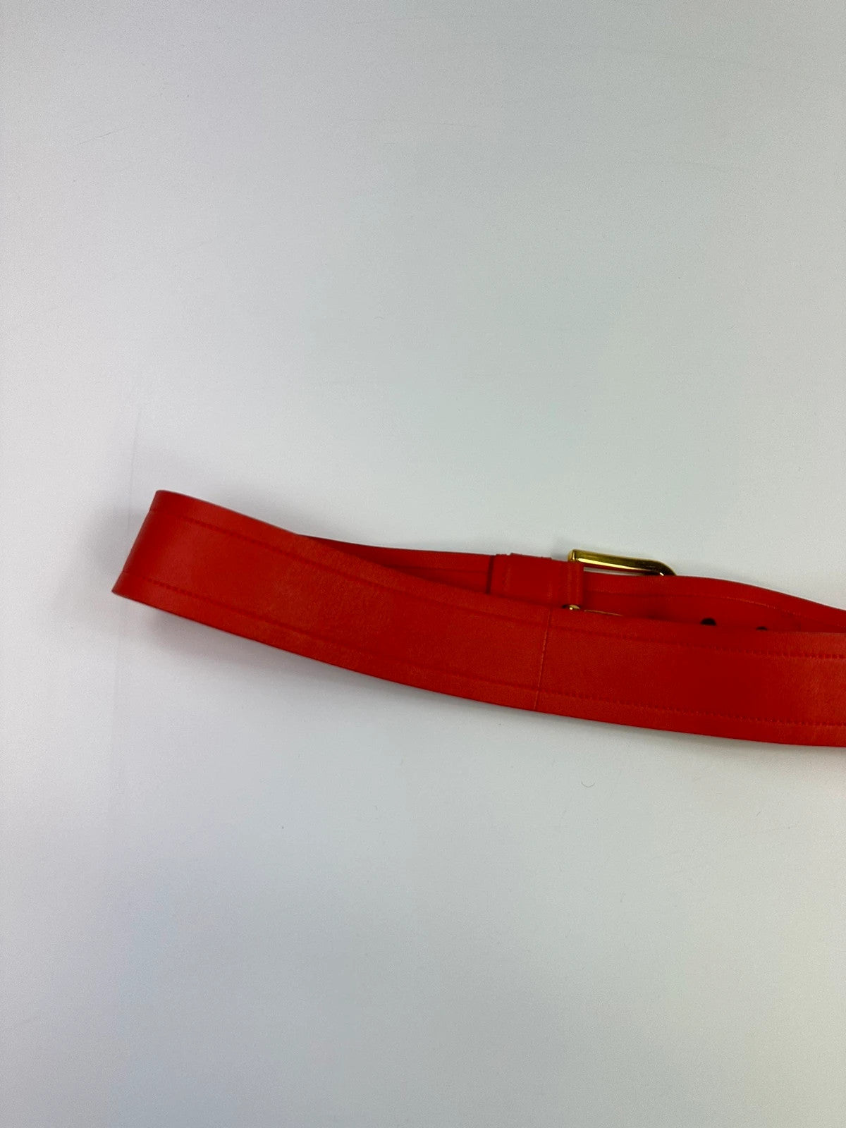 Prada burgundy leather belt with large rose gold buckle, vintage 2010 collection.