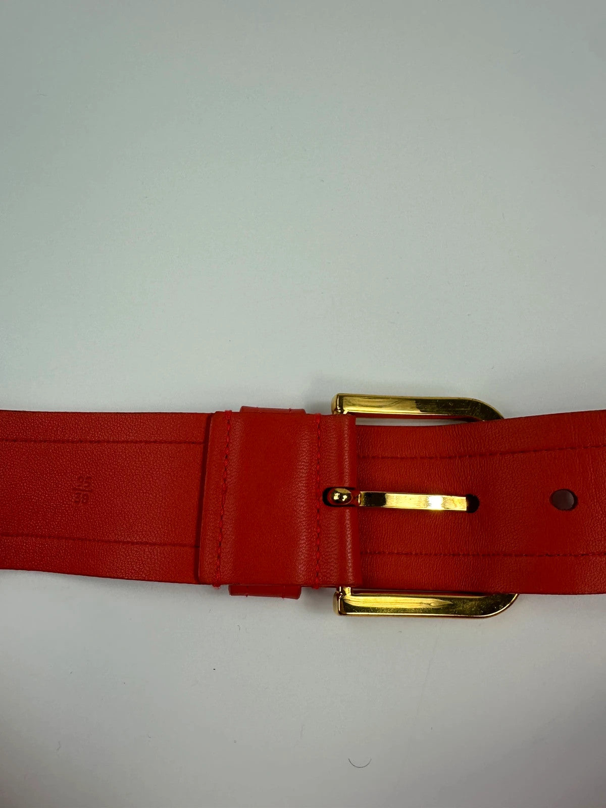 Prada burgundy leather belt with large rose gold buckle, vintage 2010 collection.