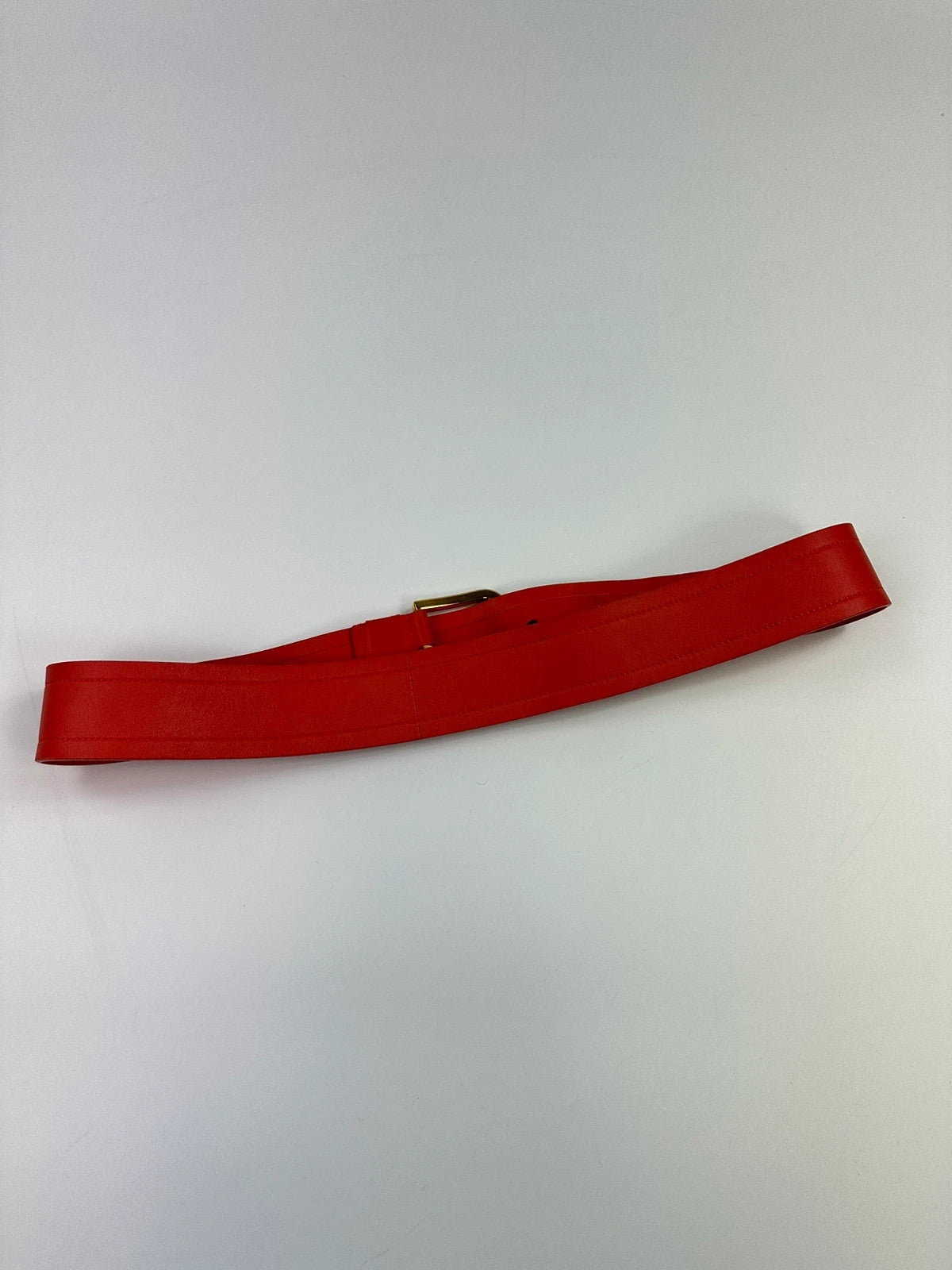 Prada burgundy leather belt with large rose gold buckle, vintage 2010 collection.