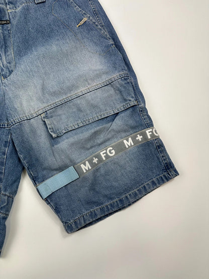 Marithé Francois Girbaud blue baggy denim shorts with cargo pockets and adjustable scratch detail.