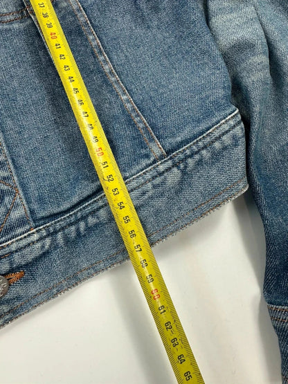 Dolce & Gabbana blue boxy crop denim jacket with logo detail and distressed finish.