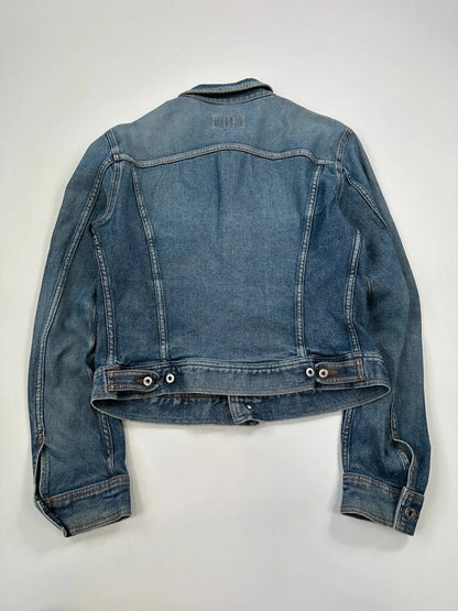 Dolce & Gabbana blue boxy crop denim jacket with logo detail and distressed finish.