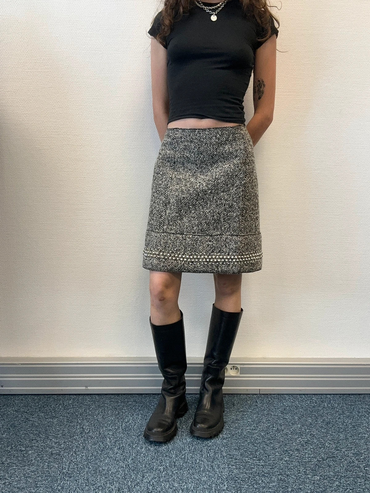 Miu Miu grey tweed skirt with strass spikes and nail details, size 44IT.