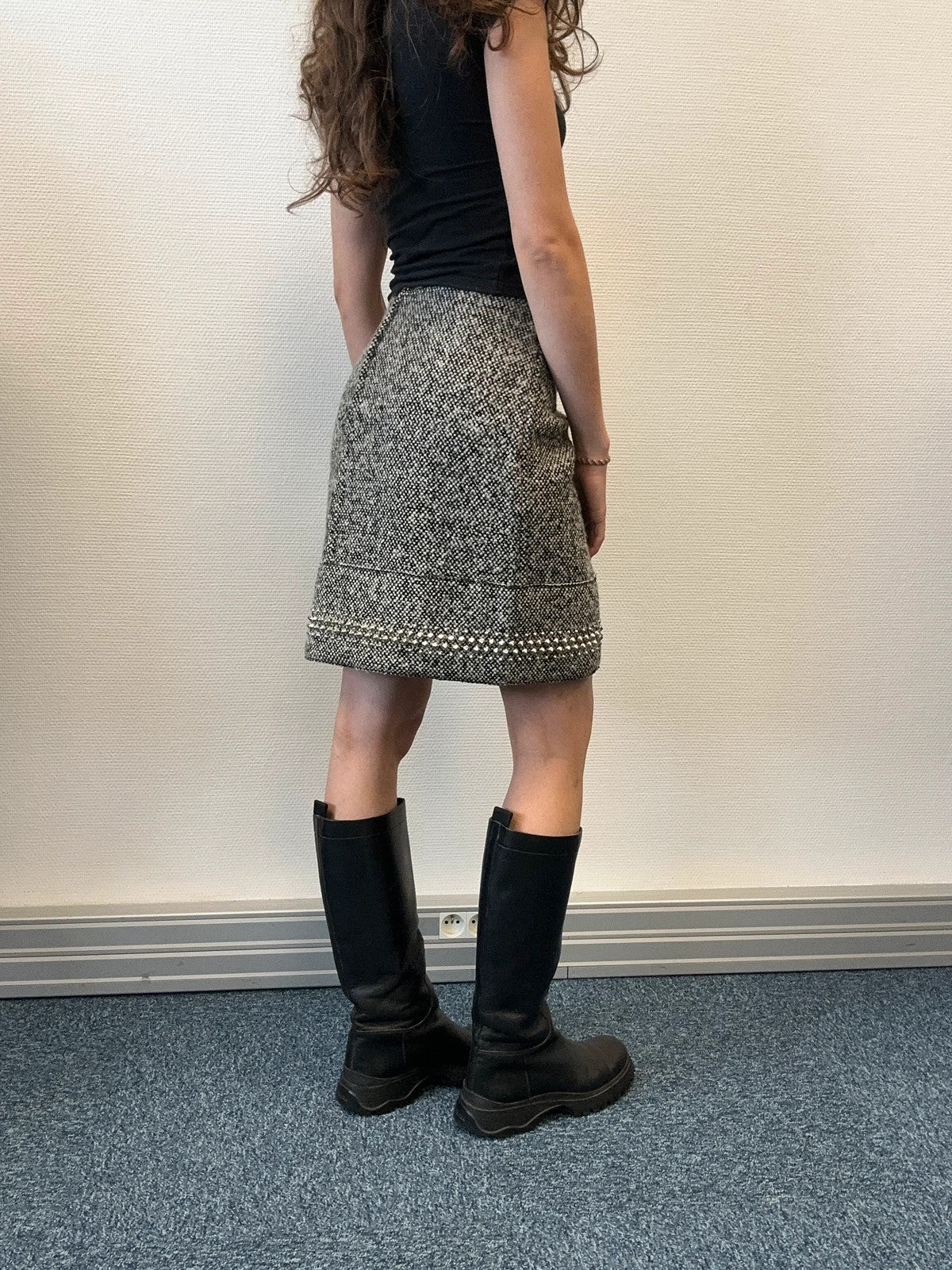 Miu Miu grey tweed skirt with strass spikes and nail details, size 44IT.