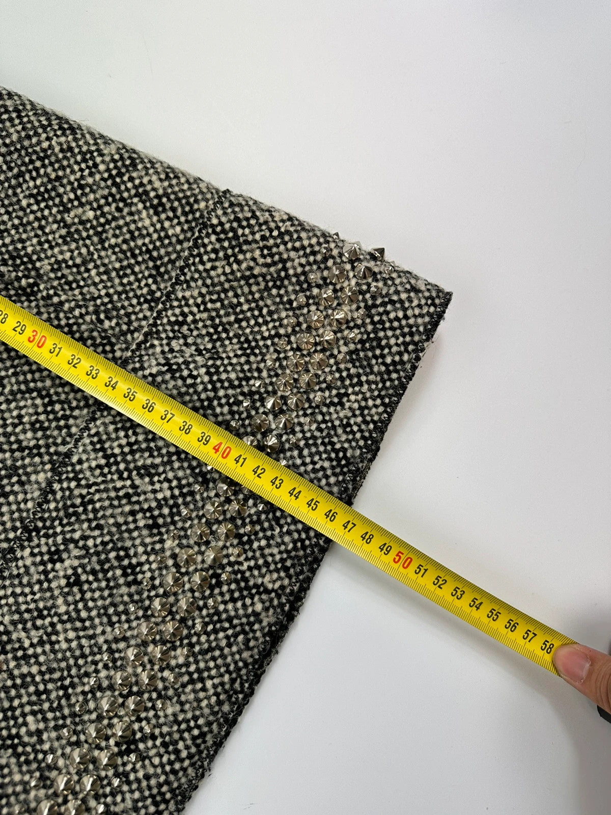 Miu Miu grey tweed skirt with strass spikes and nail details, size 44IT.