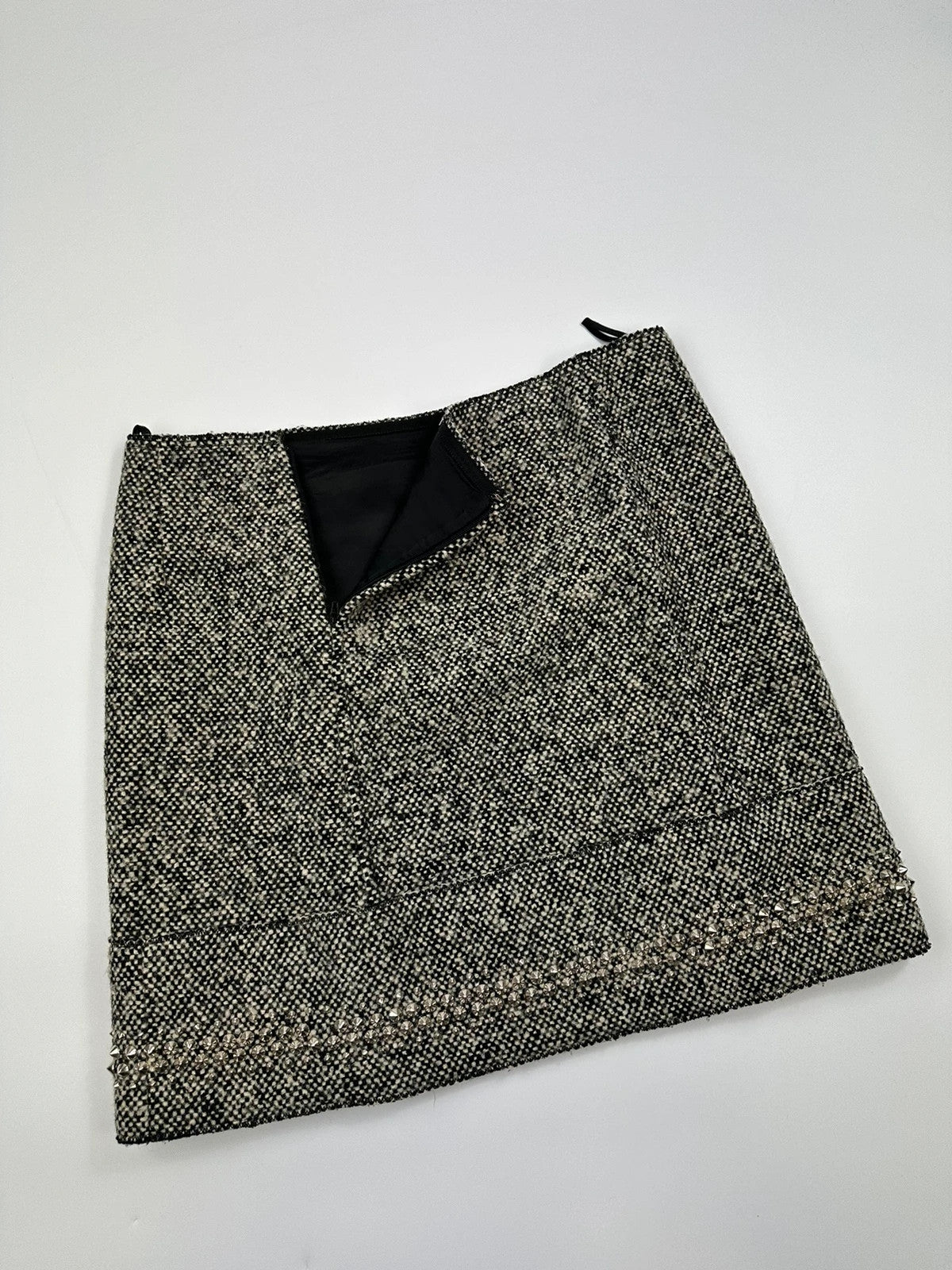 Miu Miu grey tweed skirt with strass spikes and nail details, size 44IT.