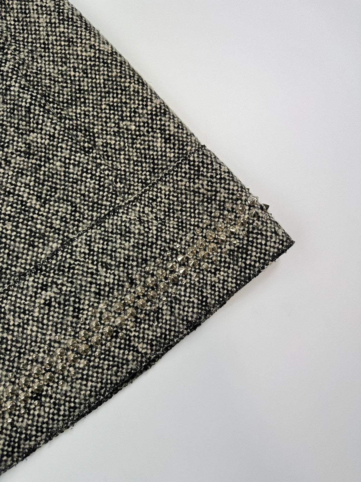 Miu Miu grey tweed skirt with strass spikes and nail details, size 44IT.