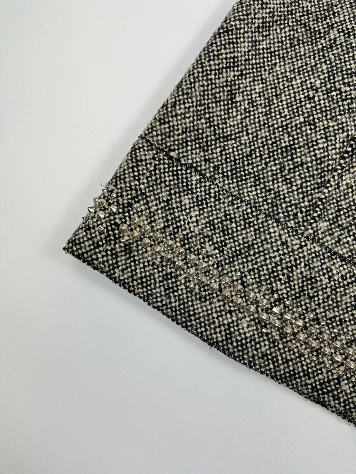Miu Miu grey tweed skirt with strass spikes and nail details, size 44IT.