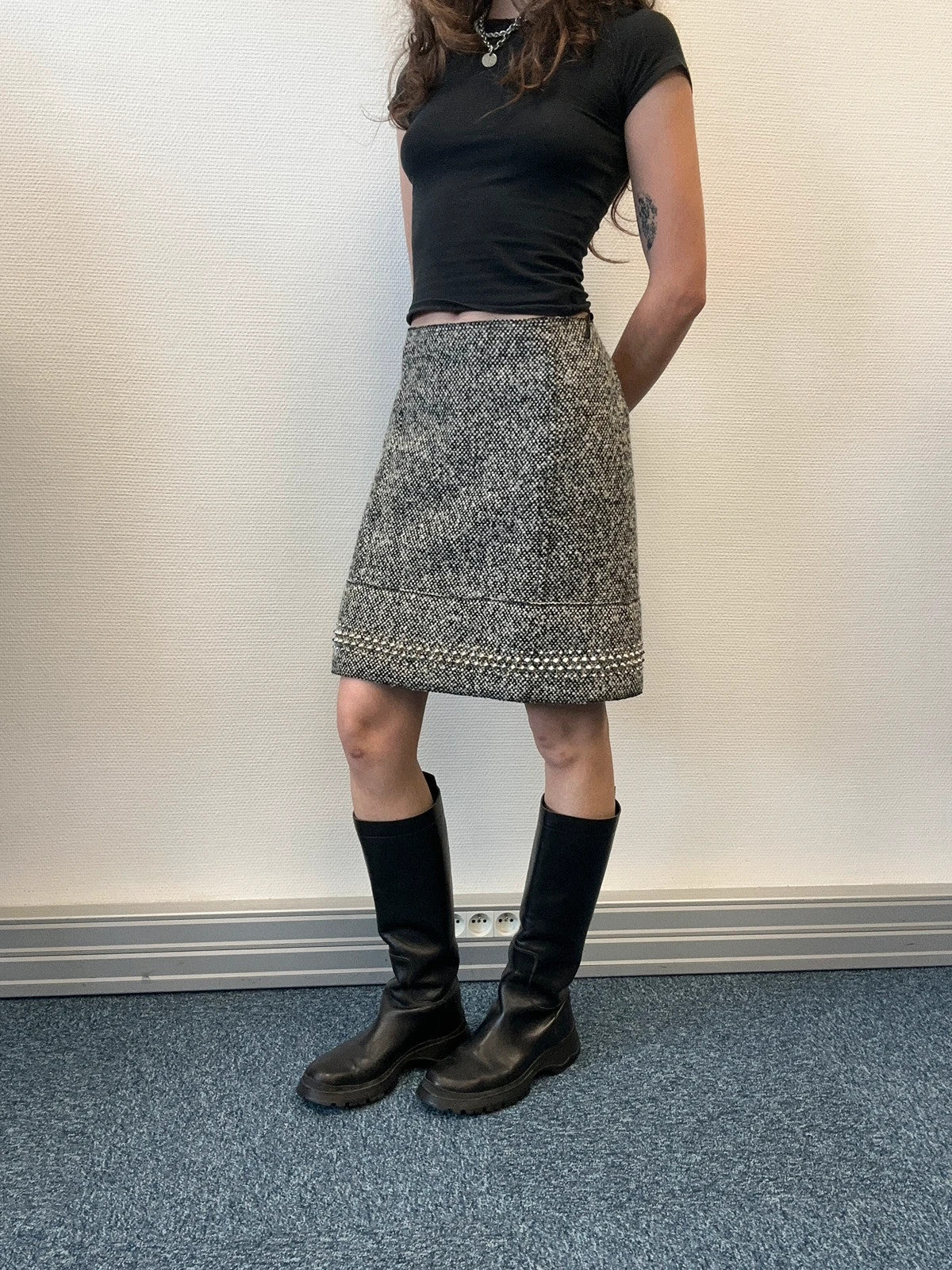 Miu Miu grey tweed skirt with strass spikes and nail details, size 44IT.