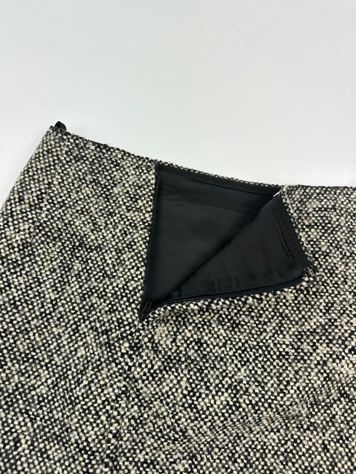 Miu Miu grey tweed skirt with strass spikes and nail details, size 44IT.