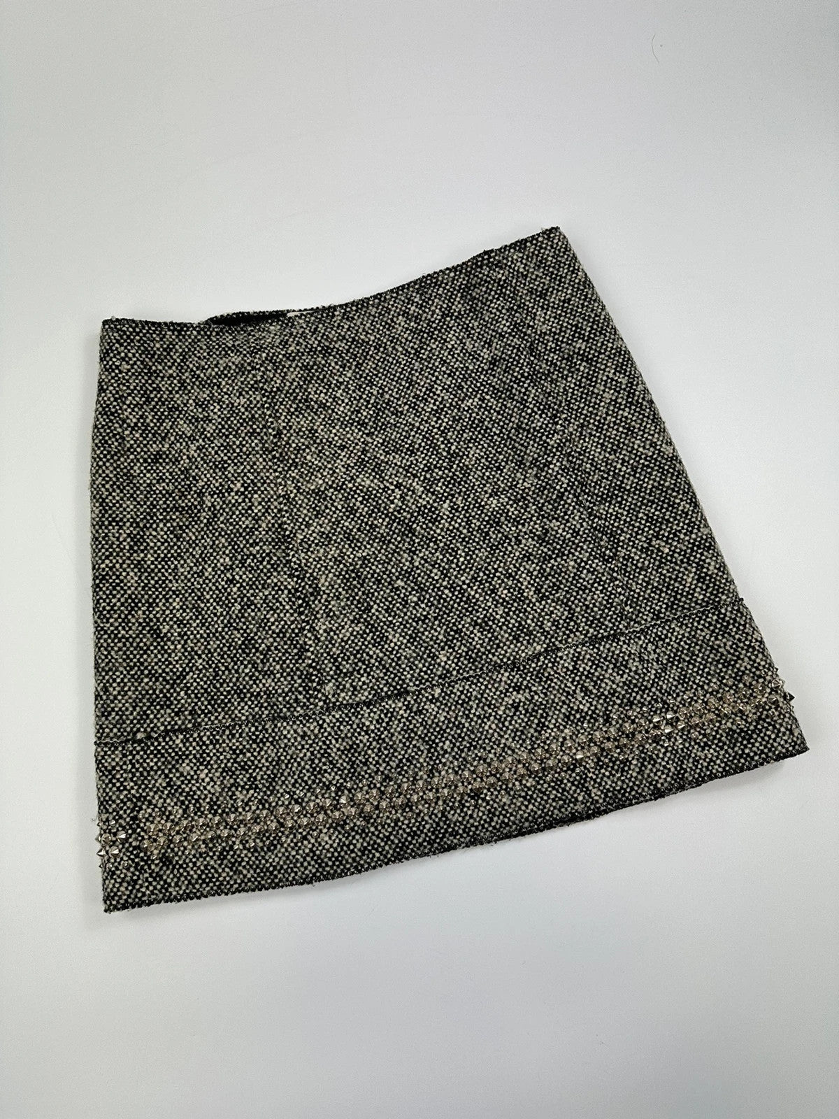 Miu Miu grey tweed skirt with strass spikes and nail details, size 44IT.