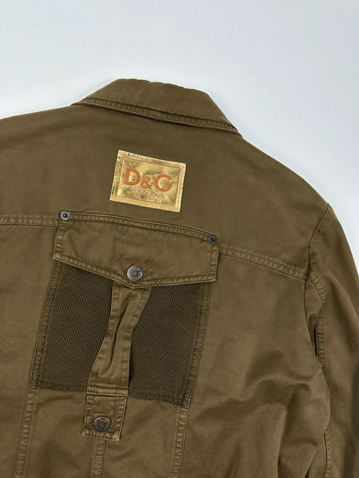 Dolce & Gabbana khaki crop jacket with army mesh pockets and logo detail.