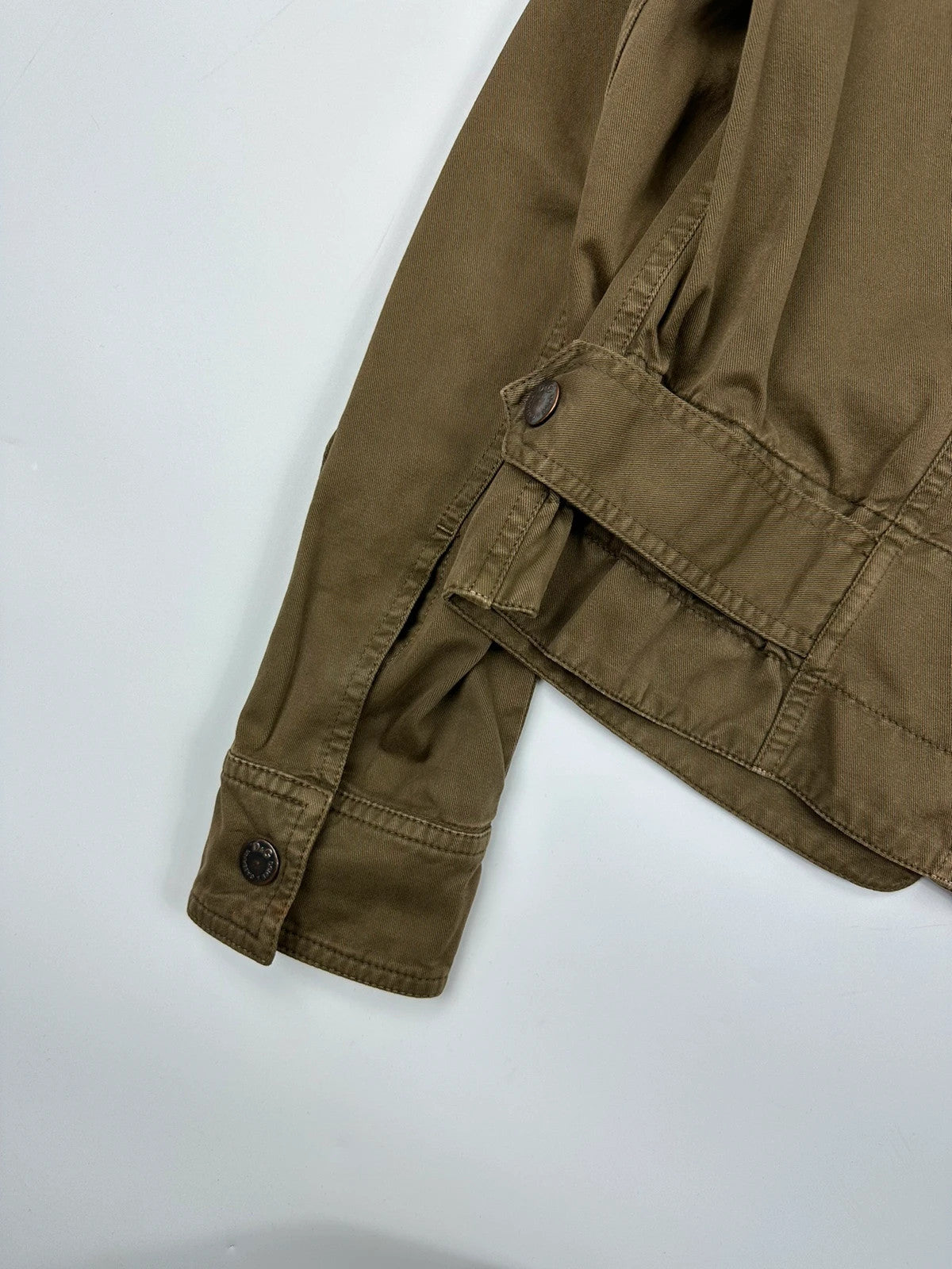 Dolce & Gabbana khaki crop jacket with army mesh pockets and logo detail.