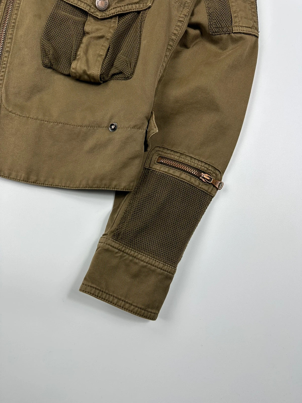 Dolce & Gabbana khaki crop jacket with army mesh pockets and logo detail.