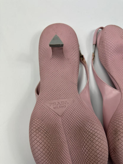 Prada pink leather heels with pointed toe and logo detail from SS2021 collection.