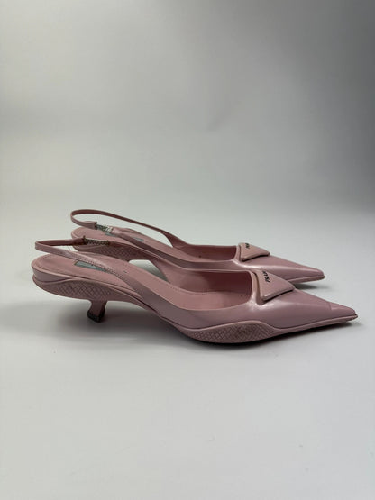 Prada pink leather heels with pointed toe and logo detail from SS2021 collection.