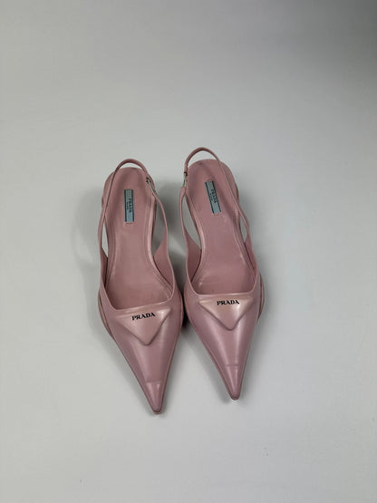 Prada pink leather heels with pointed toe and logo detail from SS2021 collection.