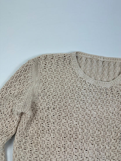 Prada beige silk knit sweater with intricate openwork design and subtle sheen.