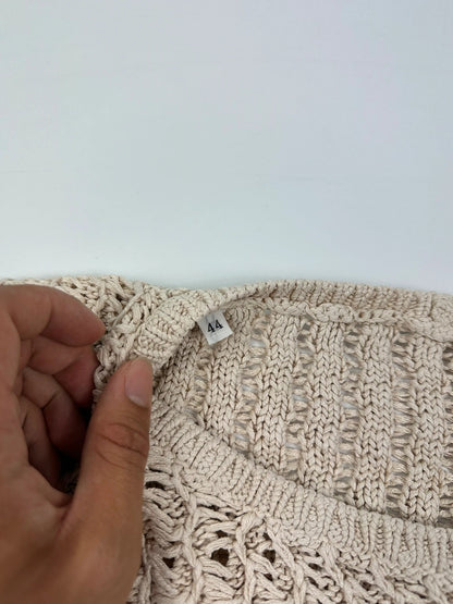 Prada beige silk knit sweater with intricate openwork design and subtle sheen.