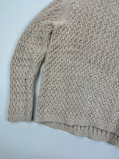 Prada beige silk knit sweater with intricate openwork design and subtle sheen.