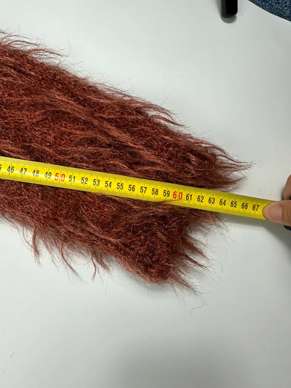 Acne Studios oversized cropped sweater in red and orange hairy knit texture.