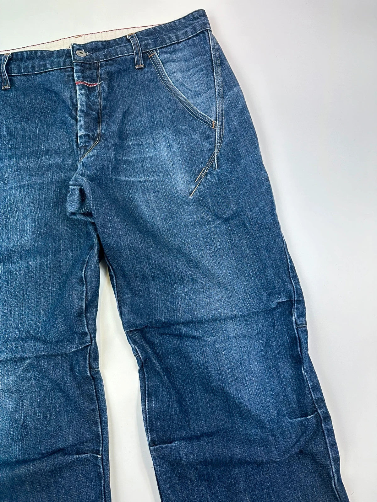 Marithé François Girbaud blue baggy jeans with wide legs and vintage 90s style.