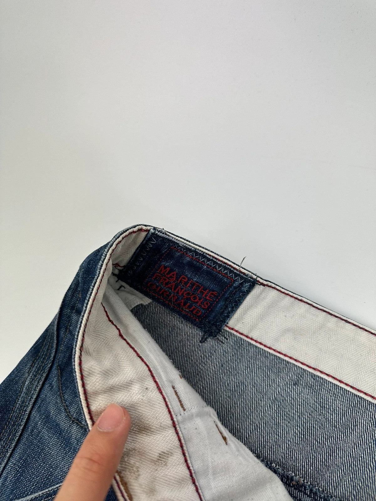 Marithé François Girbaud blue baggy jeans with wide legs and vintage 90s style.