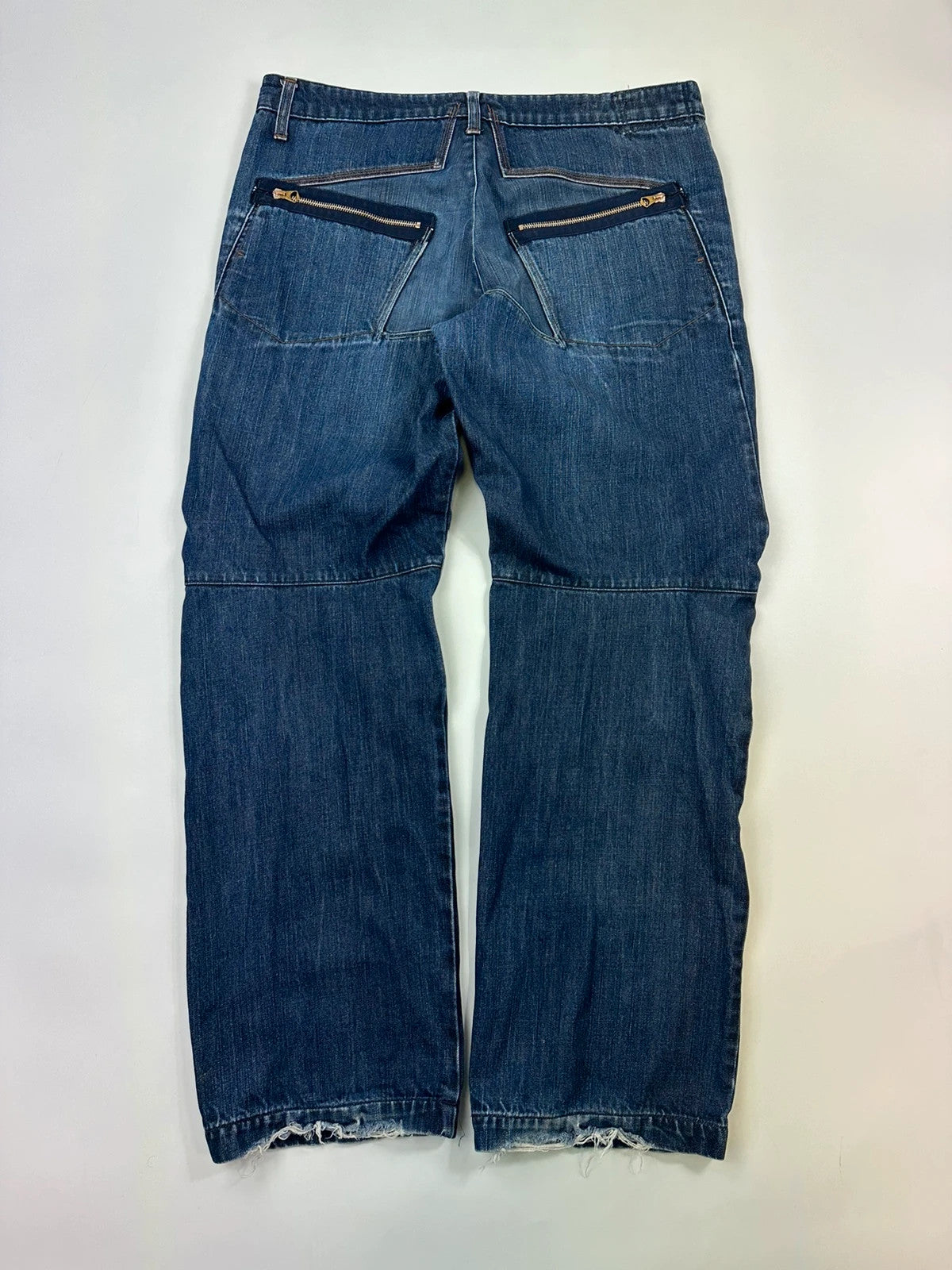 Marithé François Girbaud blue baggy jeans with wide legs and vintage 90s style.